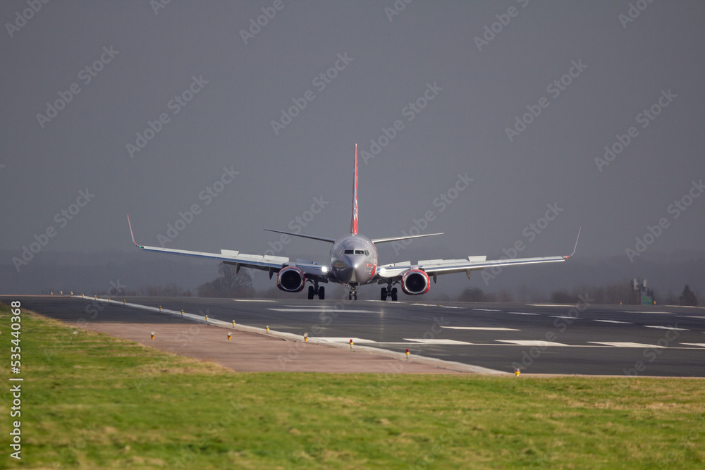 G-DRTW Just in front of heavy rain storm at east midlands airport - stock photo G-DRTW Just in front of heavy rain storm at east midlands airport - stock photo
