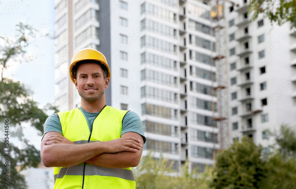 Professional engineer in safety equipment at construction site Professional engineer in safety equipment at construction site