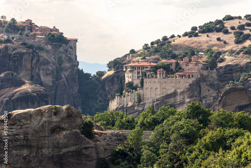 View from main observation point of Meteora over the hills and cliffs with Holy Monasteries of Varlaam on the right and Great Meteoron on the upper left, Kalambaka, Central Greece