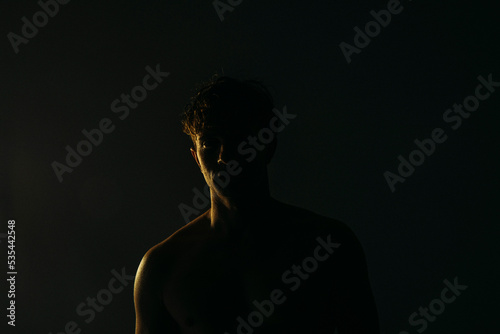 silhouette of a person in the darkness. Man shadow. Dark. 