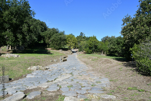 An ancient road in the archaeological park of Cuma near Naples, Italy. photo