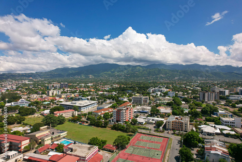 Aerial view of Kingston city, Jamaica. City landscape, roads, buildings, mountains