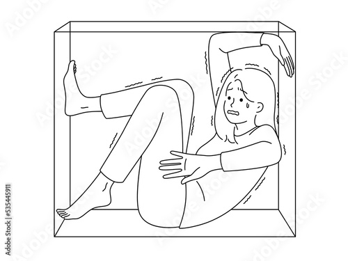 Stressed woman scared sitting in box