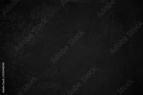 Black dark concrete wall background. Pattern board cement texture grunge dirty scratched. Blackboard blank.
