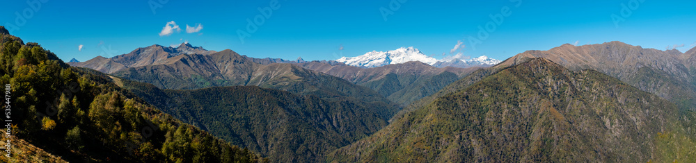 Early fall panorama of the Panoramica Zegna mountains. Is a touristic viewpoint, located in Piedmont Region (Northern Italy), Biella Province. on background: the Rosa Massif (Italian Alps).