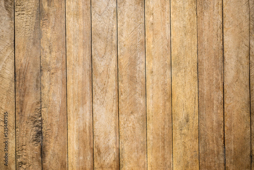 Deep brown plank wood wall.