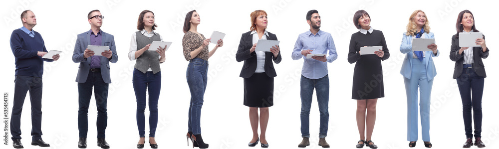 a group of people are holding a tablet and looking to the side