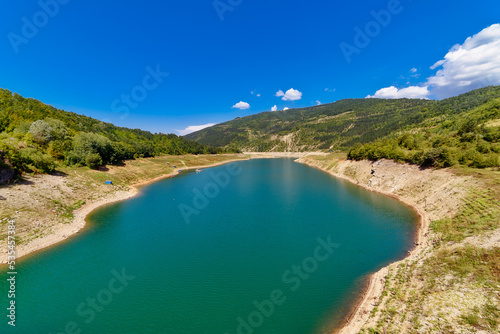 Amazing view of curvy, meandering Zavoj lake on Old Mountain, Serbia. Zavojsko Lake near Pirot © nedomacki