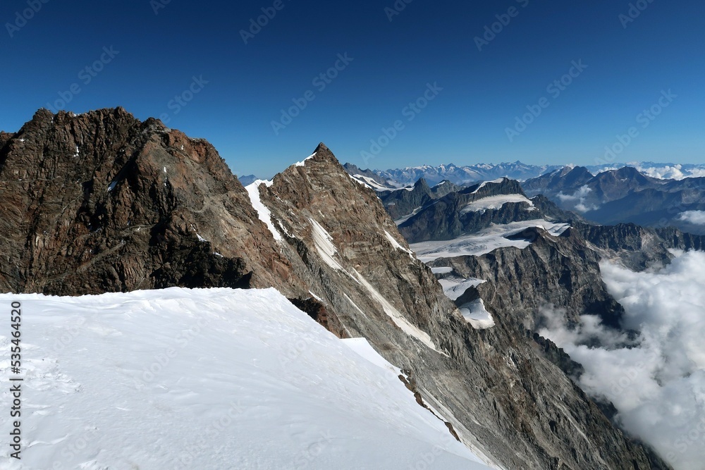 Obraz premium Multi day summer expedition through some glaciers in the alps. On the Monterosa massif starting from Zermatt and summiting multiple 4000m mountains