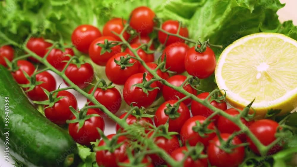 Fresh Vegetables and Herbs, Macro, Close-up, Rotation. Healthy Vegan Food, Tomato, Cucumber, Lemon Lettuce, Dill, Cilantro. Background from Vegetables and Greens. Fresh Vegetables and Herbs, Macro, Close-up, Rotation. Healthy Vegan Food, Tomato, Cucumber, Lemon Lettuce, Dill, Cilantro. Background from Vegetables and Greens.
