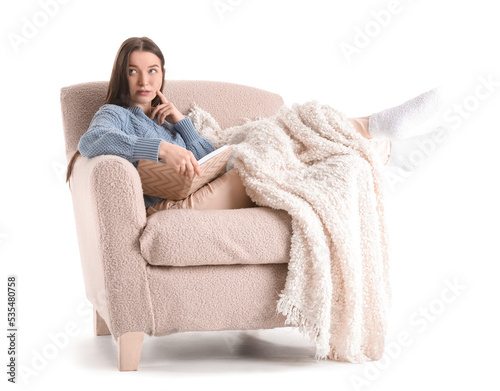 Thoughtful young woman with...