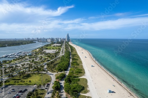 Aerial view of the Haulover beach on a bright sunny day photo