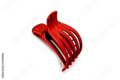 A hair clip for fixing the hair. stylish hair claw. a set of pins for beauty and fashionable hair accessories.in the common people - a crab.pin.on an isolated white background.close-up.space for text	