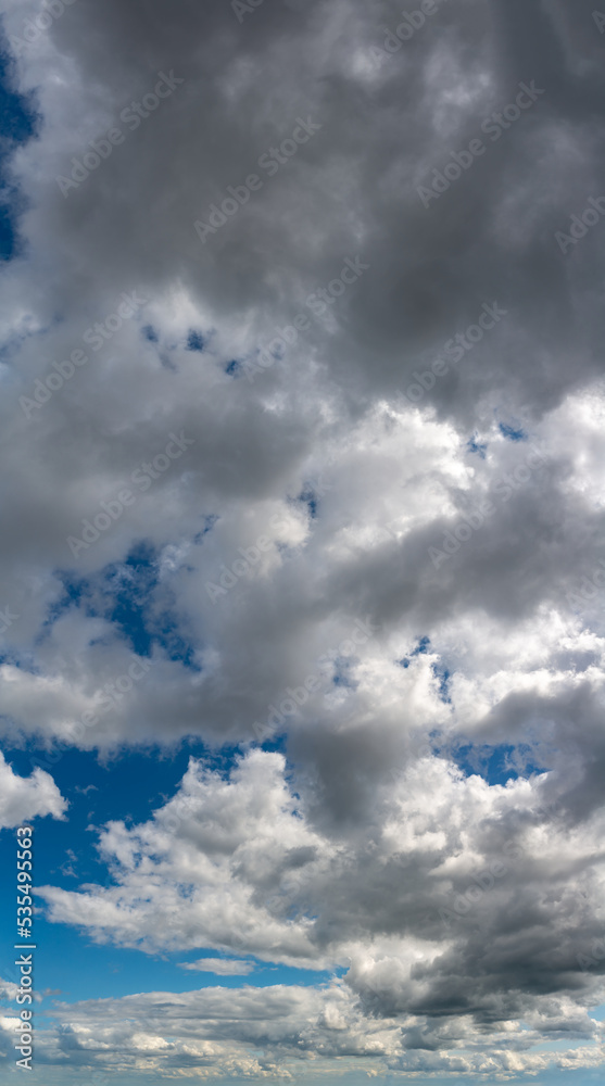 Fototapeta premium Fantastic soft thunderclouds, sky panorama