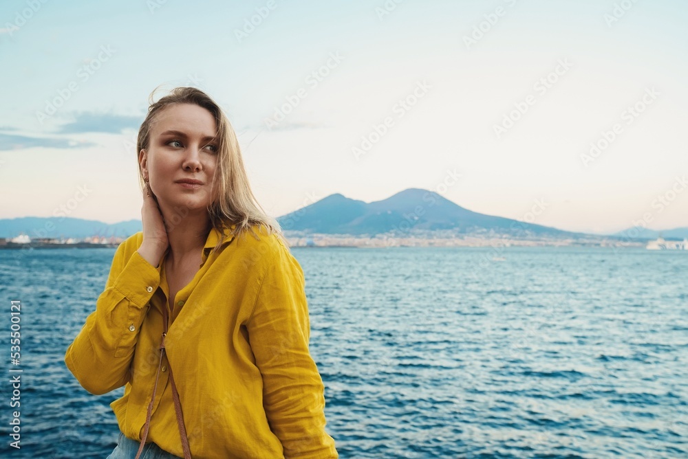 Pretty woman on the background of Vesuvius volcano in Italy. Pretty woman on the background of Vesuvius volcano in Italy.