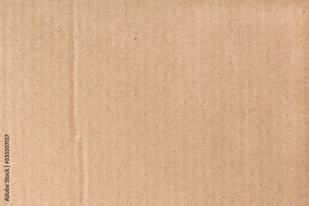 Fototapeta premium Cardboard sheet texture background, pattern of brown kraft paper with vintage style.