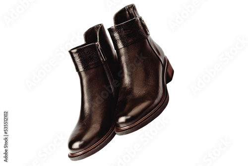 Women's demi-season high boots. classic black leather shoes with zipper.women's boots.summer shoes. on a white isolated background. high heels. 