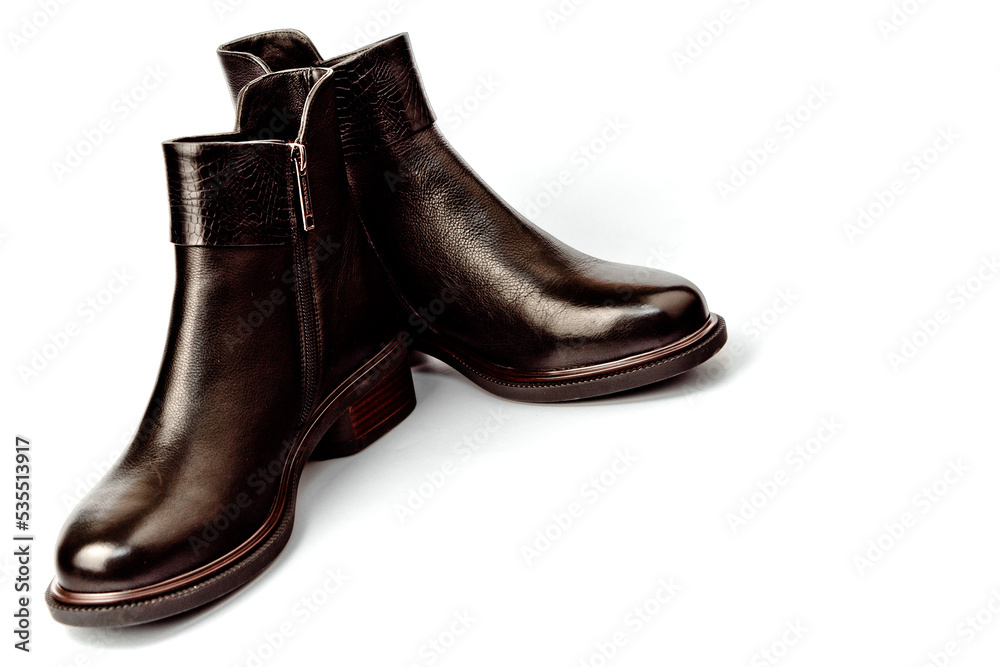 Women's demi-season high boots. classic black leather shoes with zipper.women's boots.summer shoes. on a white isolated background. high heels. Women's demi-season high boots. classic black leather shoes with zipper.women's boots.summer shoes. on a white isolated background. high heels.