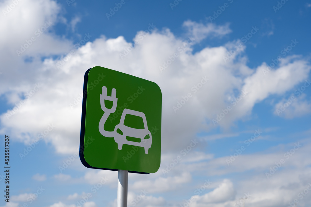 Green sign of car electric charging station. Green sign of car electric charging station.