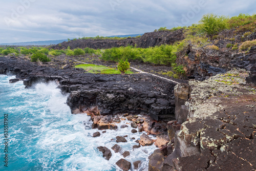 overlooking alahaka bay and ala kahakai national historic trail along south kona coast hawaii photo