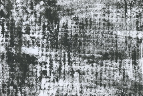 A texture unevenly filled with dirt, ink, and grit. Abstraction. Urban abstract background with a carelessly painted surface with a fine mesh pattern.