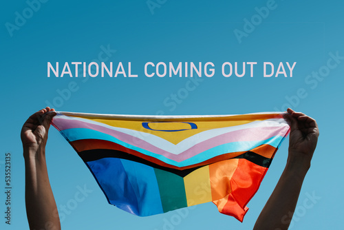 text national coming out day and pride flag photo
