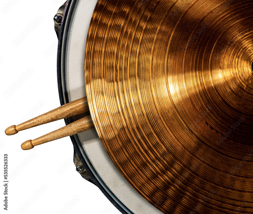 Close-up of a golden colored cymbal on a snare drum with two wooden drumsticks, isolated on transparent background. Percussion instrument. Png.  - obrazy, fototapety, plakaty 
