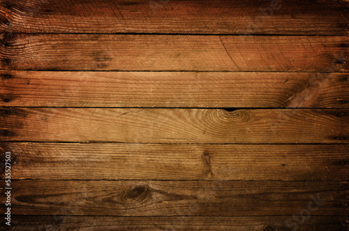Weathered dark wooden planks background