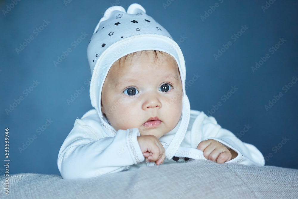 A small newborn baby girl. The concept of childhood A small newborn baby girl. The concept of childhood