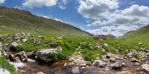 mountain valley landscape with cottage in the matese park
