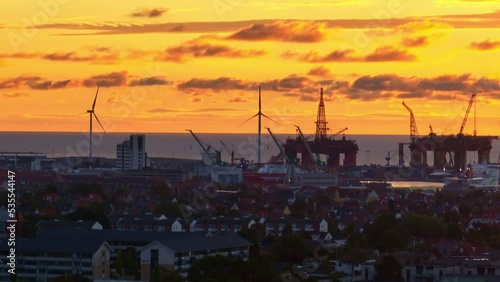 yellow sun rise at danish city