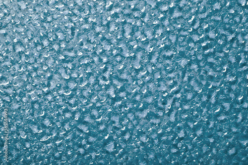 Decorative abstract background. Texture of water drops on glass