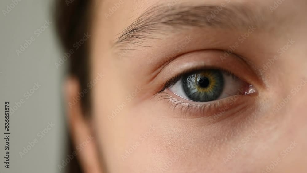 Close-up of the eye, the reflection of the house, a teenage girl closes her eyes. Close-up of the eye, the reflection of the house, a teenage girl closes her eyes.