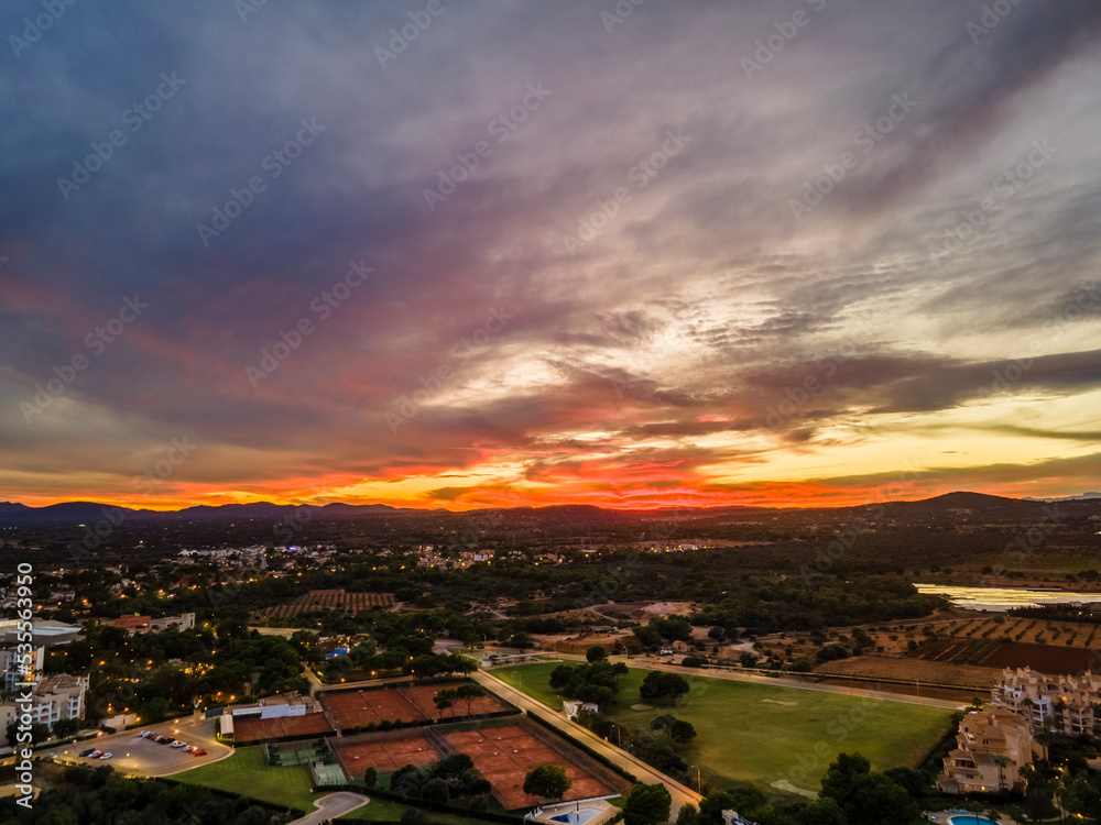 Obraz premium Sunset in Sa Coma, Mallorca from Drone Spain