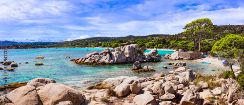 Best beaches of Corsica island - beautiful scenic Tamaricciu with rock formations and crystal turquoise waters. tropical sea landsape © Freesurf