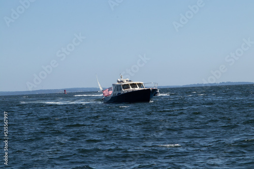 motorboat in the sea with American Flag
