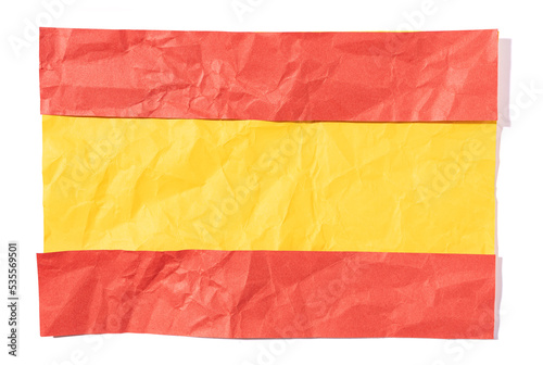 Flag of Spain made of crumpled paper isolated on white background