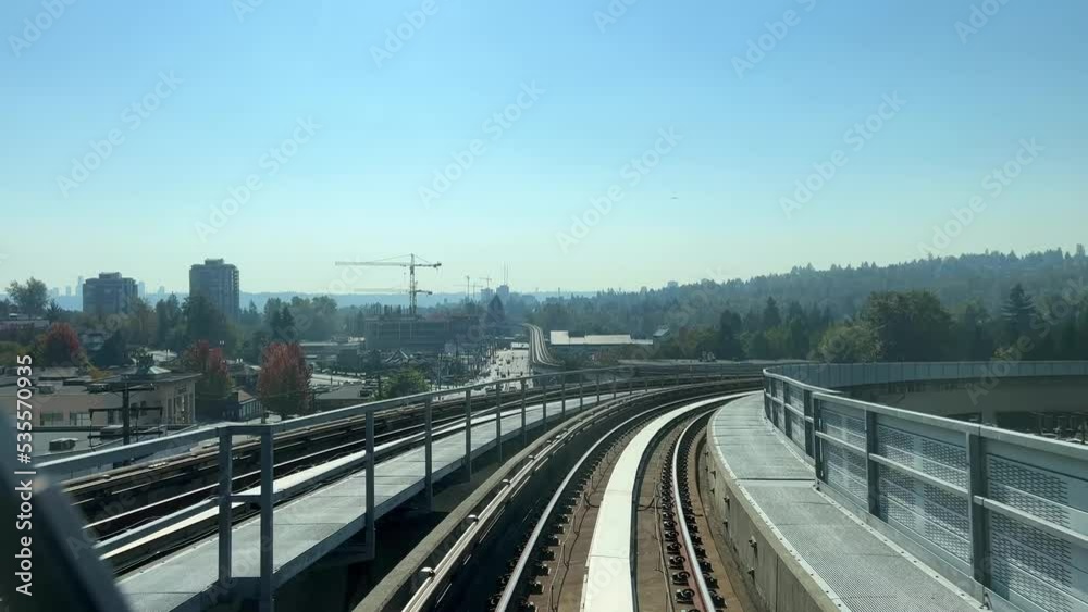 time-lapse vancouver skytrain The distance between two stops shooting in the windshield you can see the rails flickering as well as skyscrapers in the distance 09.2022 Canada time-lapse vancouver skytrain The distance between two stops shooting in the windshield you can see the rails flickering as well as skyscrapers in the distance 09.2022 Canada