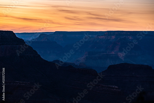 Silhouettes Of Grand Canyon Ridges In Late Evening