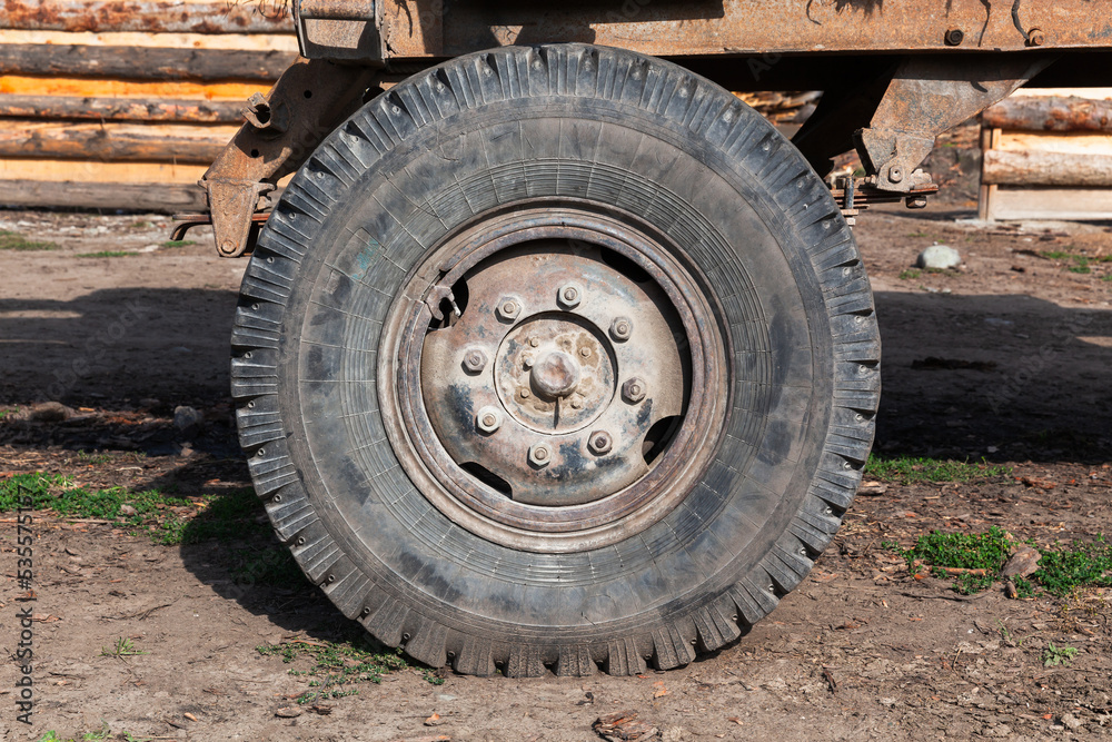 Old rusty truck wheel close up photo Old rusty truck wheel close up photo