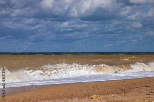 Empty beach view with shore water, landscape photo