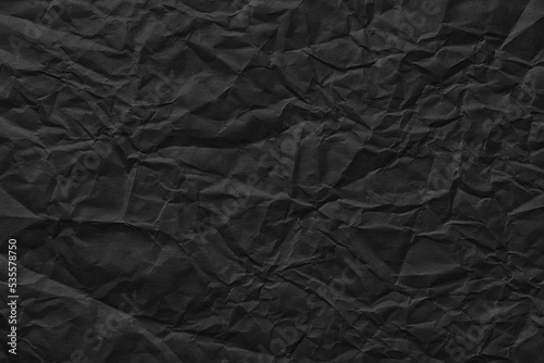 black paper background  crumpled template texture for inserting text