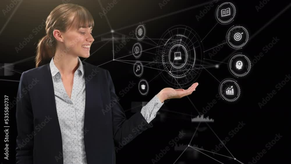 Hands of icons over happy caucasian businesswoman on black background Hands of icons over happy caucasian businesswoman on black background