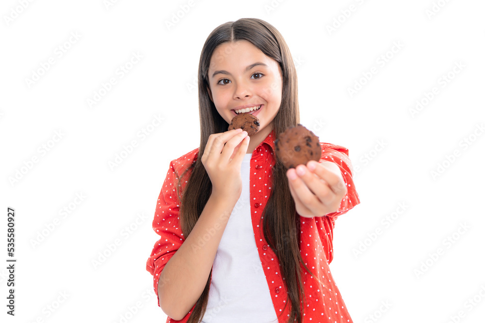 Food sweets and bakery for kids. Teenage girl eating cookie or biscuit, isolated on white background. Portrait of happy smiling teenage child girl. Food sweets and bakery for kids. Teenage girl eating cookie or biscuit, isolated on white background. Portrait of happy smiling teenage child girl.
