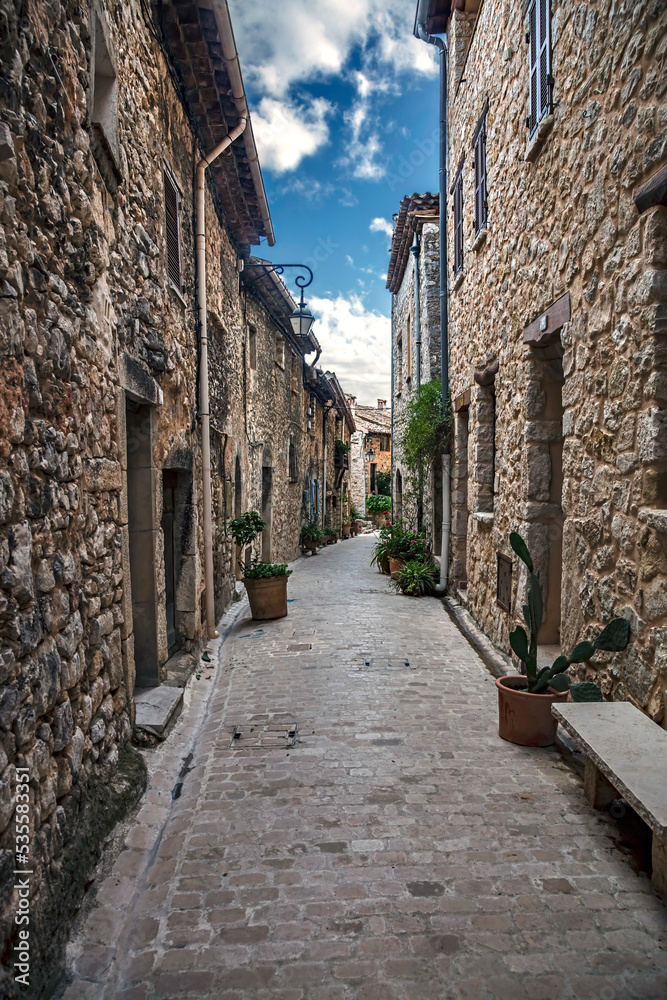 Old streets and houses of the village Tourrets sur Loup. Southern France	