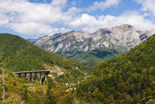 Famous Zelengora mountain peaks and Trnova Luka bridge over Sutjeska River, Sutjeska National Park, Dinaric Alps, Republika Srpska, Bosnia and Herzegovina photo