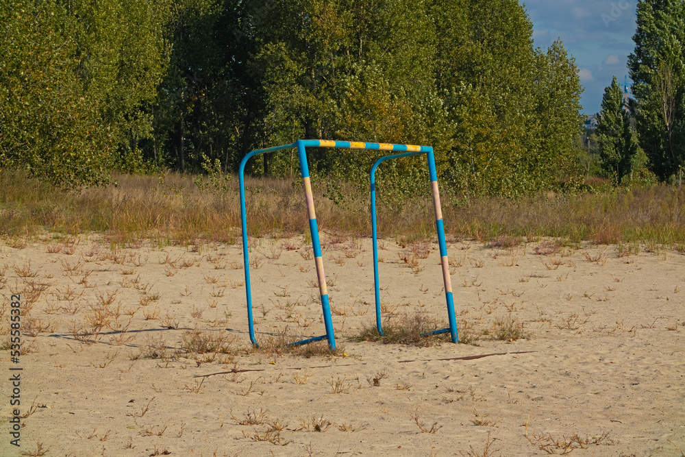 Empty football goal on a summer sunny day Empty football goal on a summer sunny day