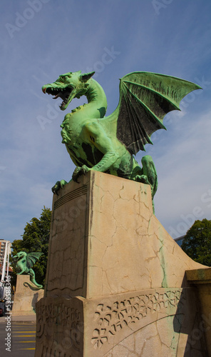 Bild auf Leinwand Dragon Bridge, or Zmajski Most, a reinforced concrete bridge which crosses the Ljubljanica River in central Ljubljana, Slovenia
