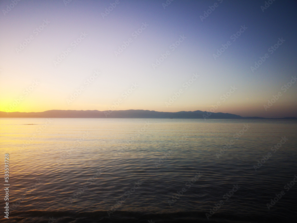 sunset over the sea, minimal background