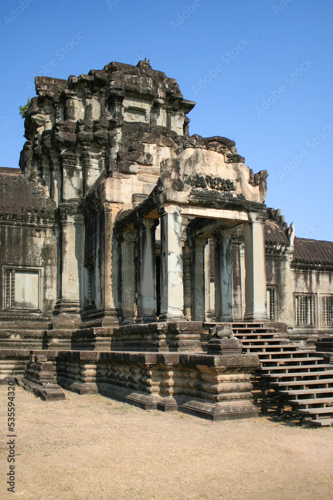 A building in Angkor Wat, a temple complex in Cambodia, the largest religious monument in the world, and a UNESCO World Heritage Site. Image has copy space. A building in Angkor Wat, a temple complex in Cambodia, the largest religious monument in the world, and a UNESCO World Heritage Site. Image has copy space.